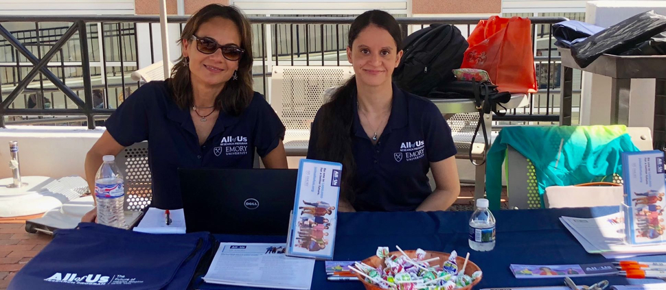  Image of two volunteers from Emory University
