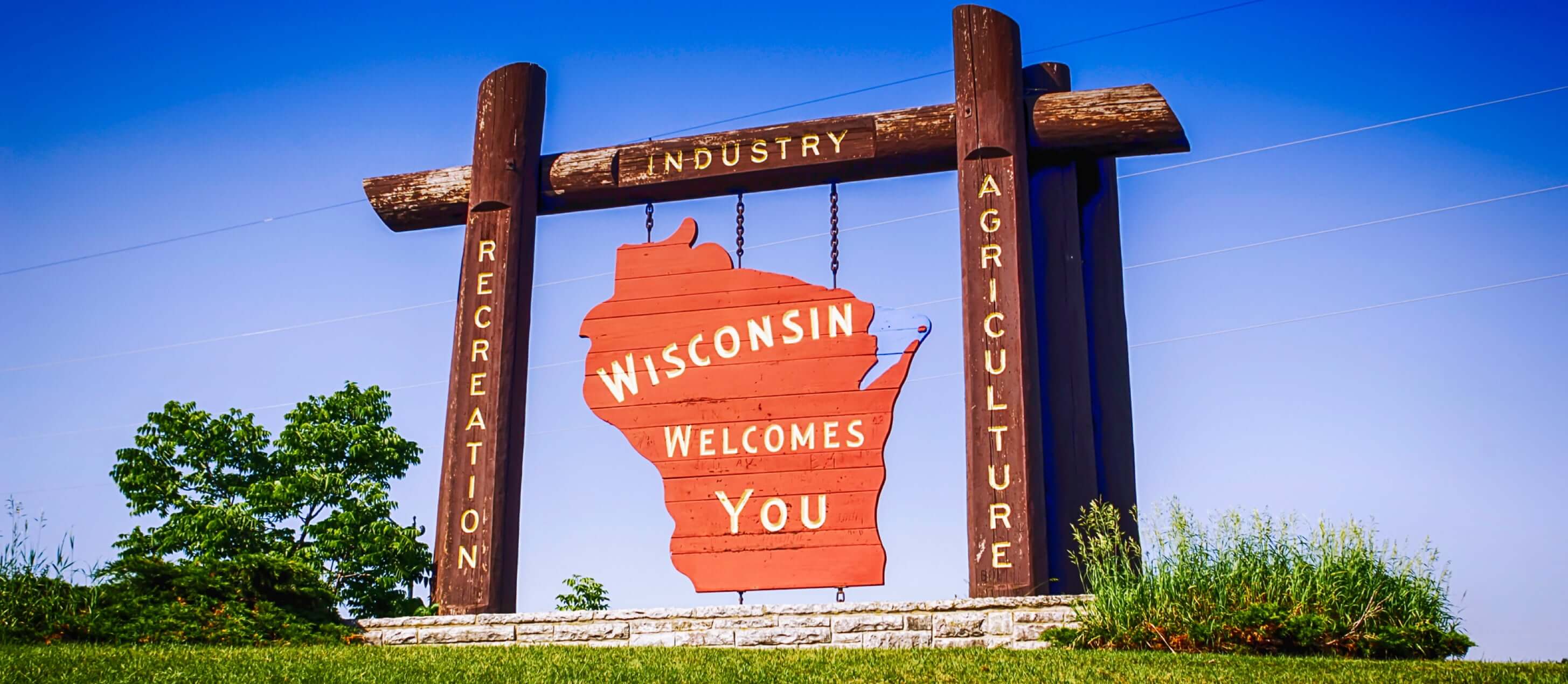 Image of "Wisconsin Welcomes You" written on sign