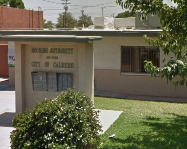 photo of a building with a City of Calexico Housing Authority placard