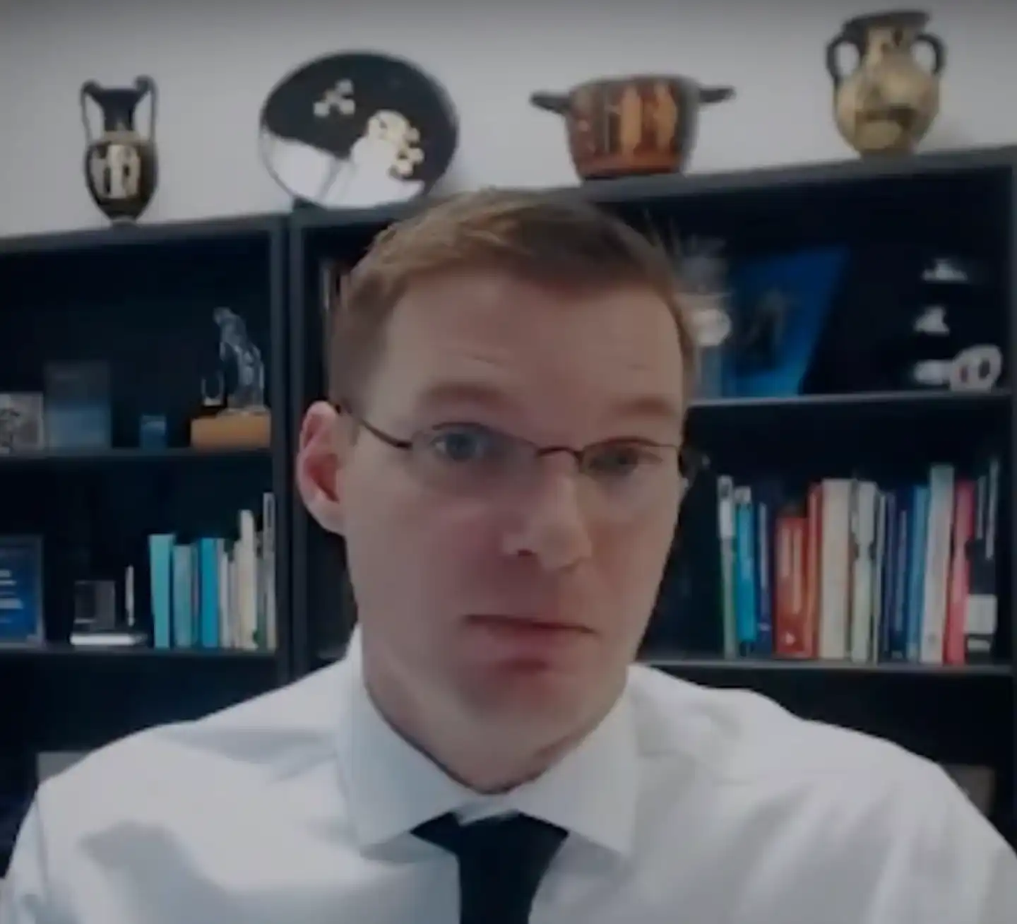 Dr. Jason Kamras at his desk with books behind him